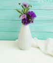 Vase flowers bell, purple elegance beauty romance spring chrysanthemum arrangement on a wooden background Royalty Free Stock Photo