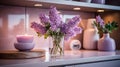 a vase with flowers and a candle on a counter Minimalist interior Kitchen with Lavender color theme