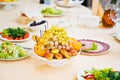 vase with fruit platter on the festive table. a delicious and healthy snack. Royalty Free Stock Photo