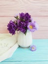 vase of chrysanthemum natural beauty flower, bell on wooden background