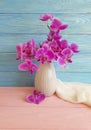 Vase orchid flower arrangement shawl color bouquet freshness modern decorate elegance arrangement on a wooden background