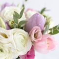 Vase of pink and purple rose bouquet close up Royalty Free Stock Photo