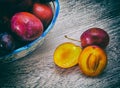 Vase with plums macro Royalty Free Stock Photo