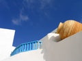 Vase set in whitewashed wall. Santorini, Greece