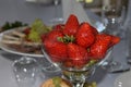 Vase with strawberries
