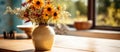 A vase of sunflowers decorates a wooden table with creative arts Royalty Free Stock Photo