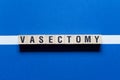 Vasectomy word concept on cubes