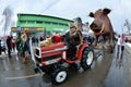 Men dressed as viking warriors with huge papier-mache statue of Wild Pig symbol of year at traditional Pereberia carnival