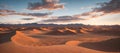 A vast desert expanse with rolling dunes under a sunny sky. Generative AI Royalty Free Stock Photo