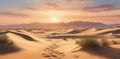 A vast desert landscape at sunrise, with towering sand dunes