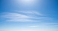 Vast Expansive Blue Sky with Wispy White Clouds and Bright Sunlight Royalty Free Stock Photo