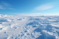 Vast frozen tundra at midday. Empty clear horizon. Plain after a snowstorm. Winter landscape Royalty Free Stock Photo