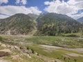 Vast green meadows and mountains