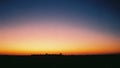 Vast Horizon at Dusk with Gradient Sky and Silhouetted Trees on a Dark Landscape 20260104 Royalty Free Stock Photo