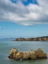 Vast ocean with waves, rocks in the middle of the sea and cliffs. Royalty Free Stock Photo