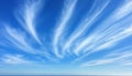Vast Open Sky with Wispy Cloud Streaks, Capturing Celestial Serenity in a Vibrant Blue Atmosphere Royalty Free Stock Photo