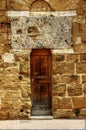 Massive granite lintel over doorway in Tuscan city