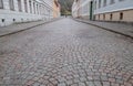 Vastra Skansgarten cobblestone street with traditional wooden houses in the historic Haga district of Gothenburg, Sweden.