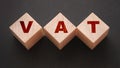 VAT letters on wooden cubes. Value Added Tax Financial concept Royalty Free Stock Photo