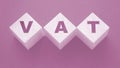 VAT letters on wooden cubes. Value Added Tax Financial concept Royalty Free Stock Photo