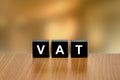 VAT or value added tax on black block Royalty Free Stock Photo