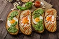 Vatiations of fried eggs inside bread