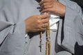 A nun praying the holy Rosary