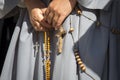 A religious prays the holy rosary