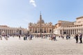 VATICAN CITY - APRIL 27, 2019: Tourists in Saint Peter`s Square, Piazza di San Pietro.