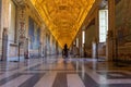 Vatican city museum. Gallery of maps. Hall with marble floor and gold ceiling.