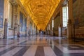 Vatican city museum. Gallery of maps. Hall with marble floor and gold ceiling.