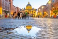 Vatican City by night. Illuminated dome of St Peters Basilica and St Peters Square. Group of tourists on Via della Royalty Free Stock Photo