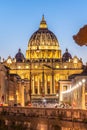 Vatican City by night. Illuminated dome of St Peters Basilica and St Peters Square at the end of Via della Conciliazione Royalty Free Stock Photo