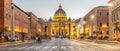 Vatican City by night. Illuminated dome of St Peters Basilica and St Peters Square at the end of Via della Conciliazione