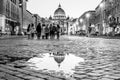 Vatican City by night. Illuminated dome of St Peters Basilica and St Peters Square. Group of tourists on Via della Royalty Free Stock Photo