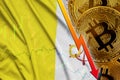 Vatican City State flag and cryptocurrency falling trend with many golden bitcoins