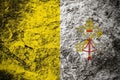 Vatican City State flag on stone background