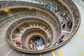 Unidentified people go down spiral stairs in Vatican Museums, Rome, Italy Royalty Free Stock Photo