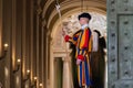 VATICAN CITY, VATICAN - MARCH 31: Member of the Pontifical Swiss Guard stand guard in Saint Peters Basilica on March 31, 2019,