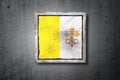 Vatican flag in concrete wall