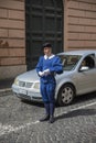 Vatican - June 18, 2014 : Pontifical Swiss Guard soldier guards entrance