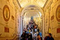 Vatican museum art hallway and tourist crowd view Royalty Free Stock Photo