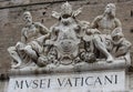 The Vatican Museums, Musei Vaticani, sculpture above the entrancedoor Royalty Free Stock Photo