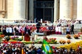 Vatican People attending a religious ceremony.