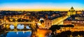 Night view of St. Peter's Basilica and the Tiber river in Vatican City, Rome, Italy