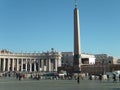 Vatican, Rome, Italy, December 10, 2007, Tuscan order semicircular columns frame St. Peter`s Square. Egyptian obelisk Royalty Free Stock Photo