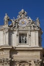 Facade of Saint Peter\'s Basilica with decorative clock on a top, Vatican, Rome, Italy