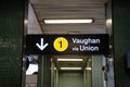 Vaughan via Union sign on subway station platform.