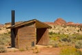 A vault toilet in the desert Royalty Free Stock Photo