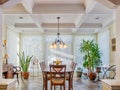 Vaulted ceilings in luxury yellow dining room